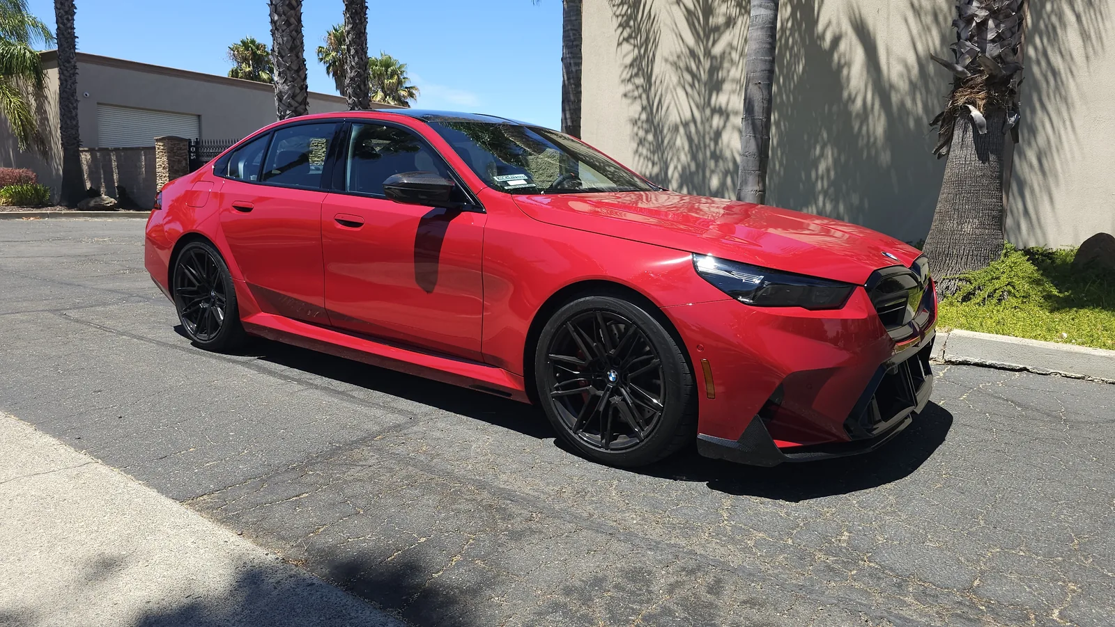 M5 profile with a gloss black roof wrap