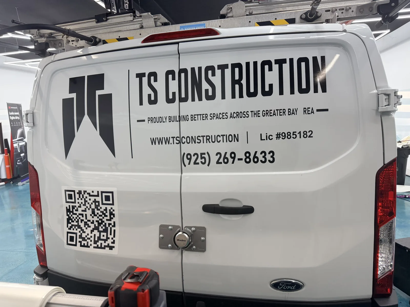 TS Construction van with cut vinyl lettering